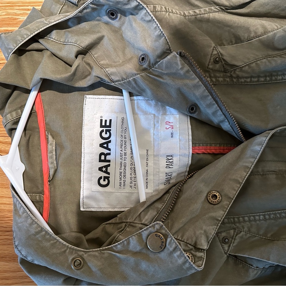 Small green garage jacket